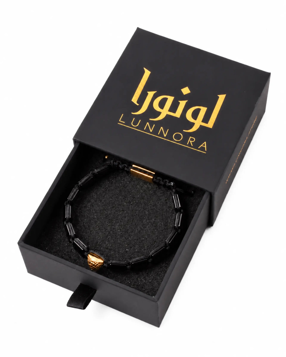 Gold-accented black bead bracelet in gift box with Liali LUNNORA branding