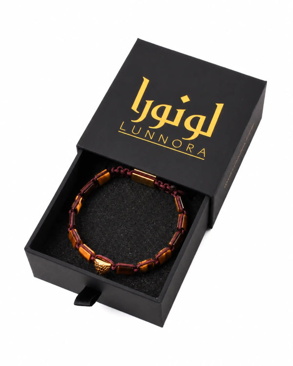 Tiger eye style bead bracelet in black gift box with gold logo