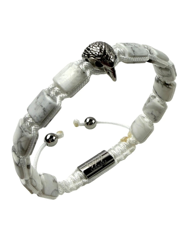 White howlite beaded bracelet with silver falcon head charm and toggle clasp