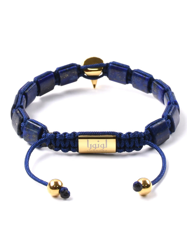 Lapis lazuli beaded bracelet with gold tag and gold falcon-head centerpiece