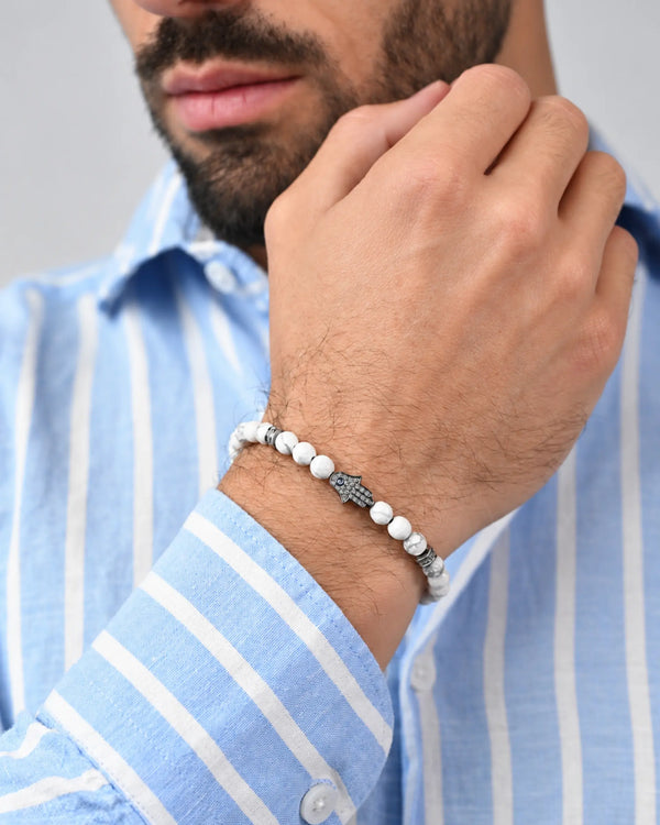 Howlite bead bracelet with silver clasp on wrist