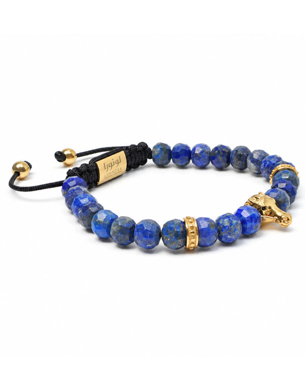 Adjustable lapis lazuli bead bracelet with gold-tone horse toggle and black cord