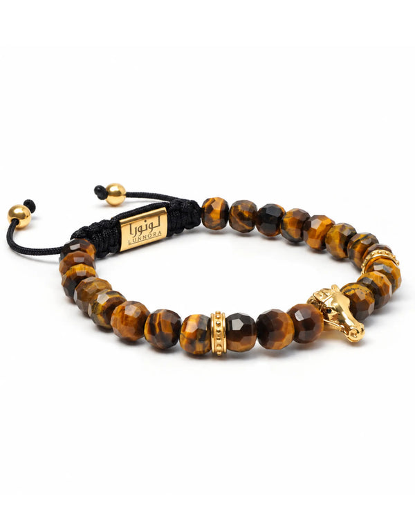 Adjustable tiger eye bead bracelet on black cord with gold-tone horse charm.