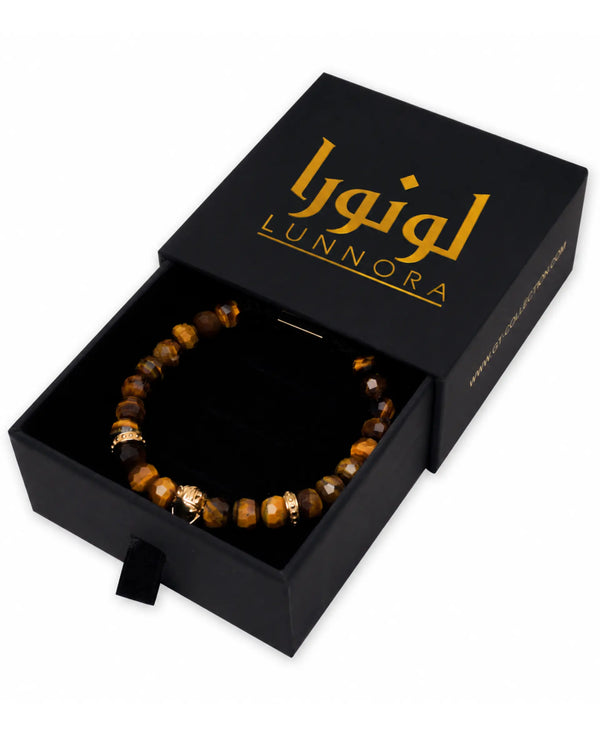 Tiger eye bead bracelet in black gift box, showing gold-tone horse charm.