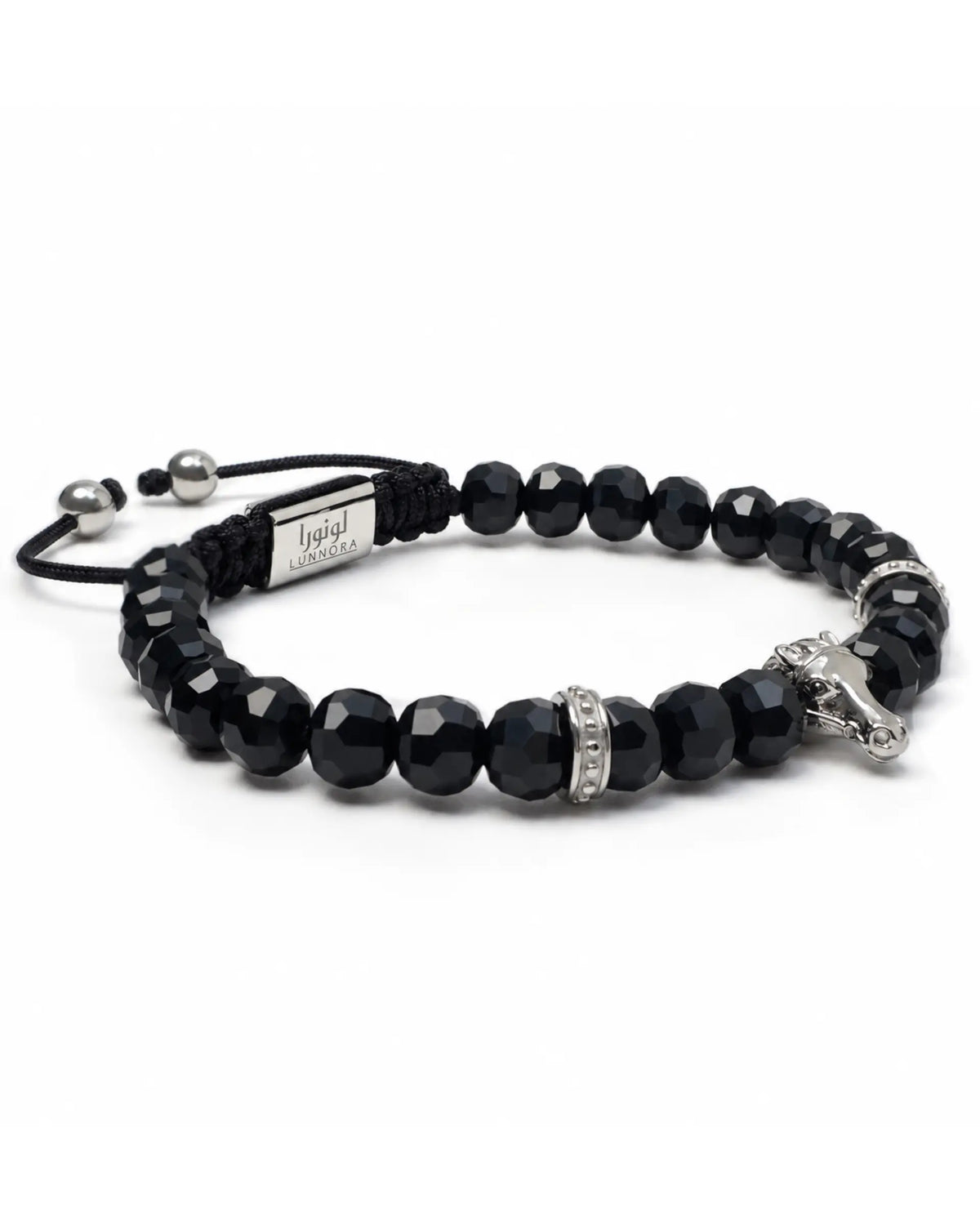 Black beaded bracelet with silver-tone horse head charm and silver-tone side accents