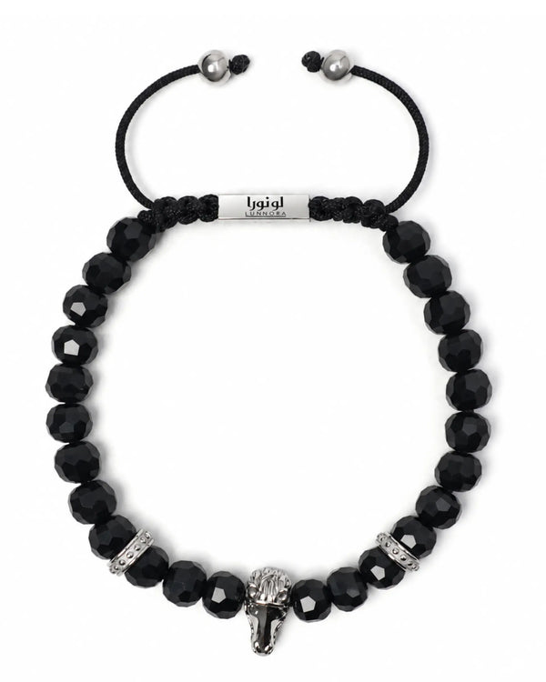 Black beaded bracelet with silver-tone horse head charm and adjustable black cord tie
