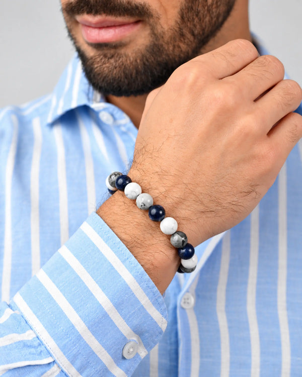 Single-row gemstone bead bracelet with dark blue, white, and gray round beads