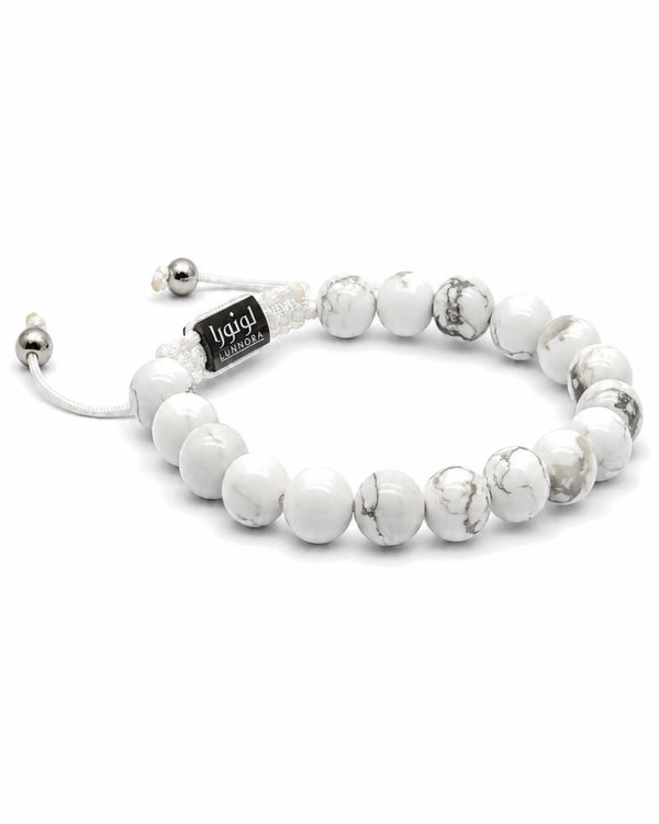 Howlite beaded bracelet with black engraved tag, white round beads and silver clasp