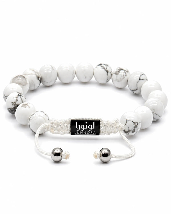 Howlite bead bracelet with LUNNORA tag and silver accents, gray-veined beads