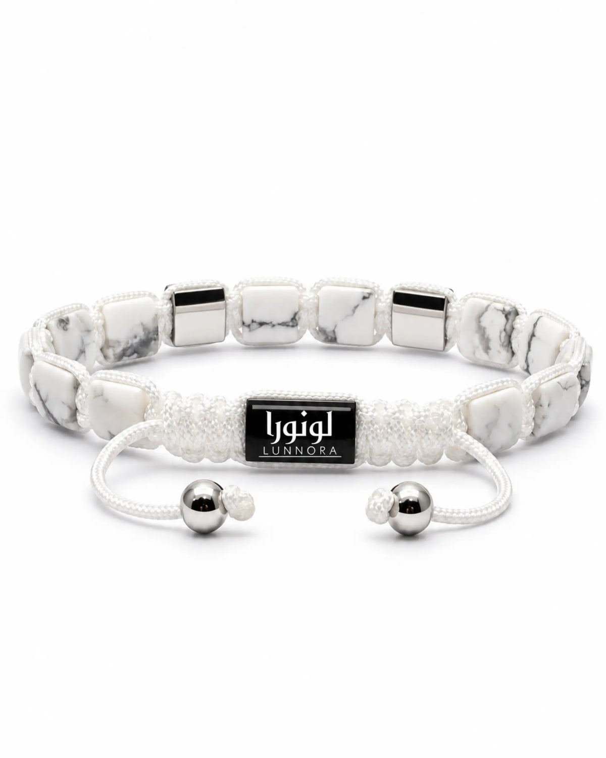 Howlite bead bracelet with black square accents, white cord ends and LUNNORA tag