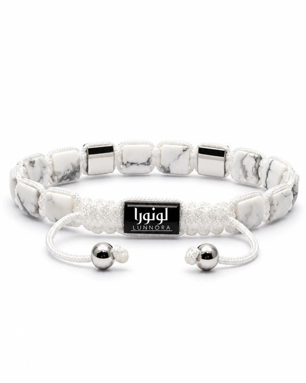 Howlite bead bracelet with black square accents, white cord ends and LUNNORA tag