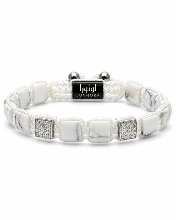 White Howlite beaded bracelet with rectangular silver-tone beads and black logo label