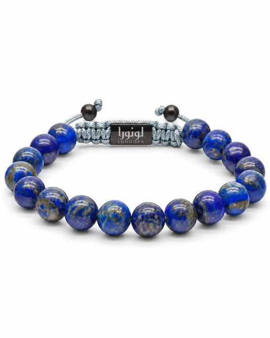 Blue round lapis-style bead bracelet with silver cord and LUNORA center charm
