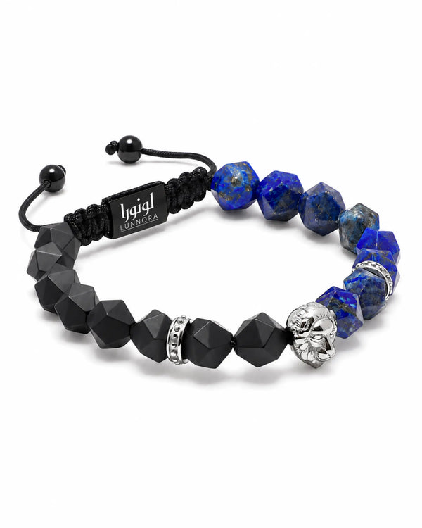 Beaded bracelet with blue lapis lazuli beads, black onyx cubes, and silver lion head charm