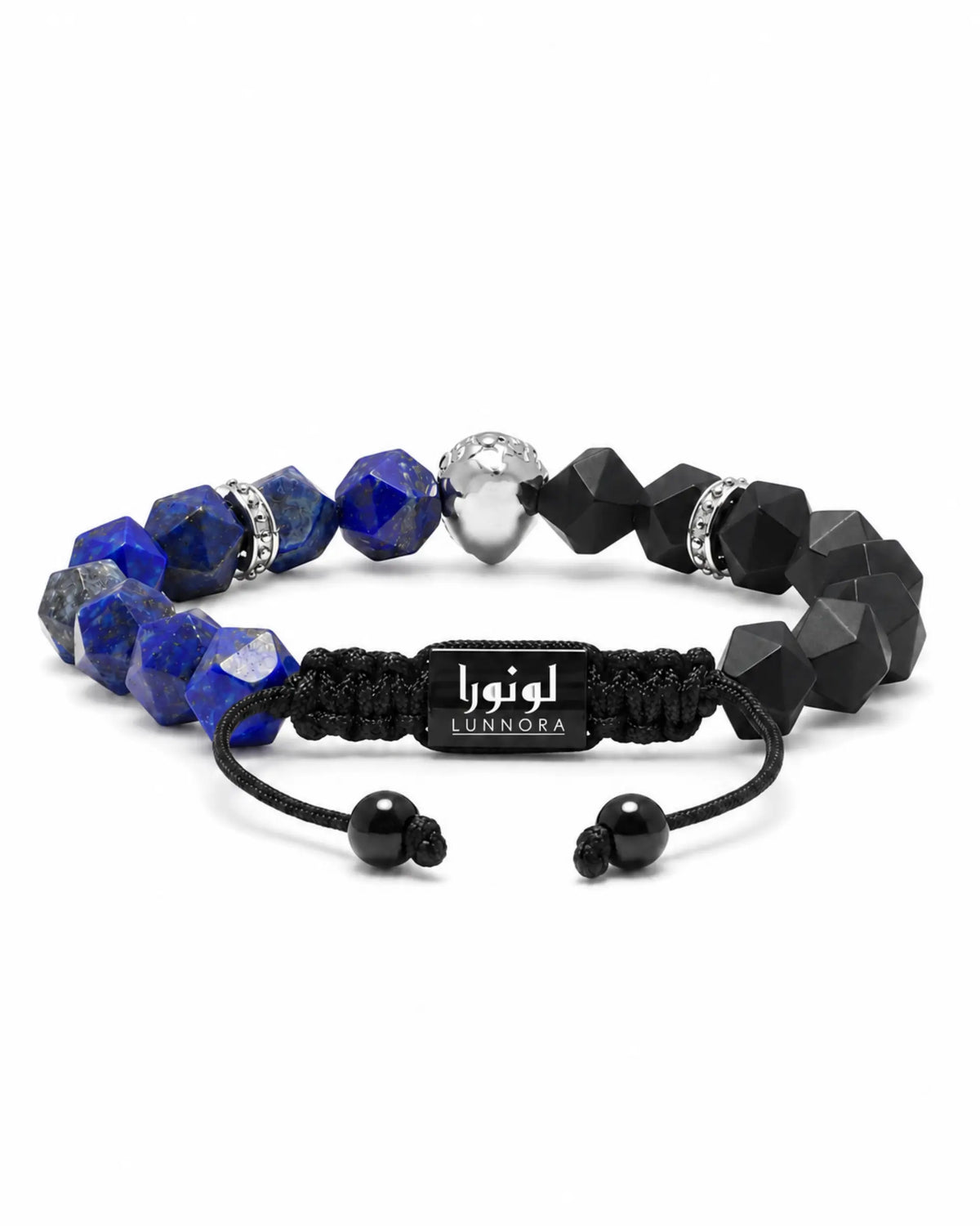 Beaded bracelet with blue lapis lazuli section, black onyx cubes, and silver emblem charm