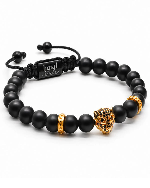 Men's black bead bracelet set with gold-toned leopard head charm and ring accents