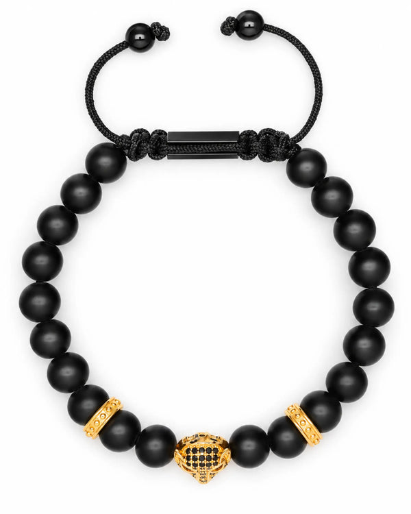 Black beaded bracelet with knotted cord and gold leopard center charm