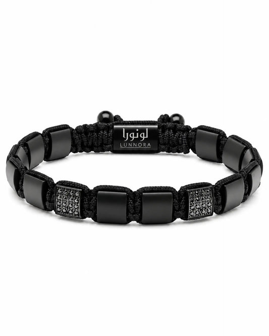 Black onyx look bracelet with engraved logo plate and textured rectangular bead panels