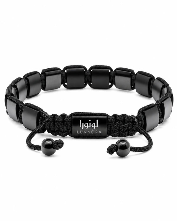 Black onyx flat bead bracelet with adjustable cord and central LUNNORA slide clasp