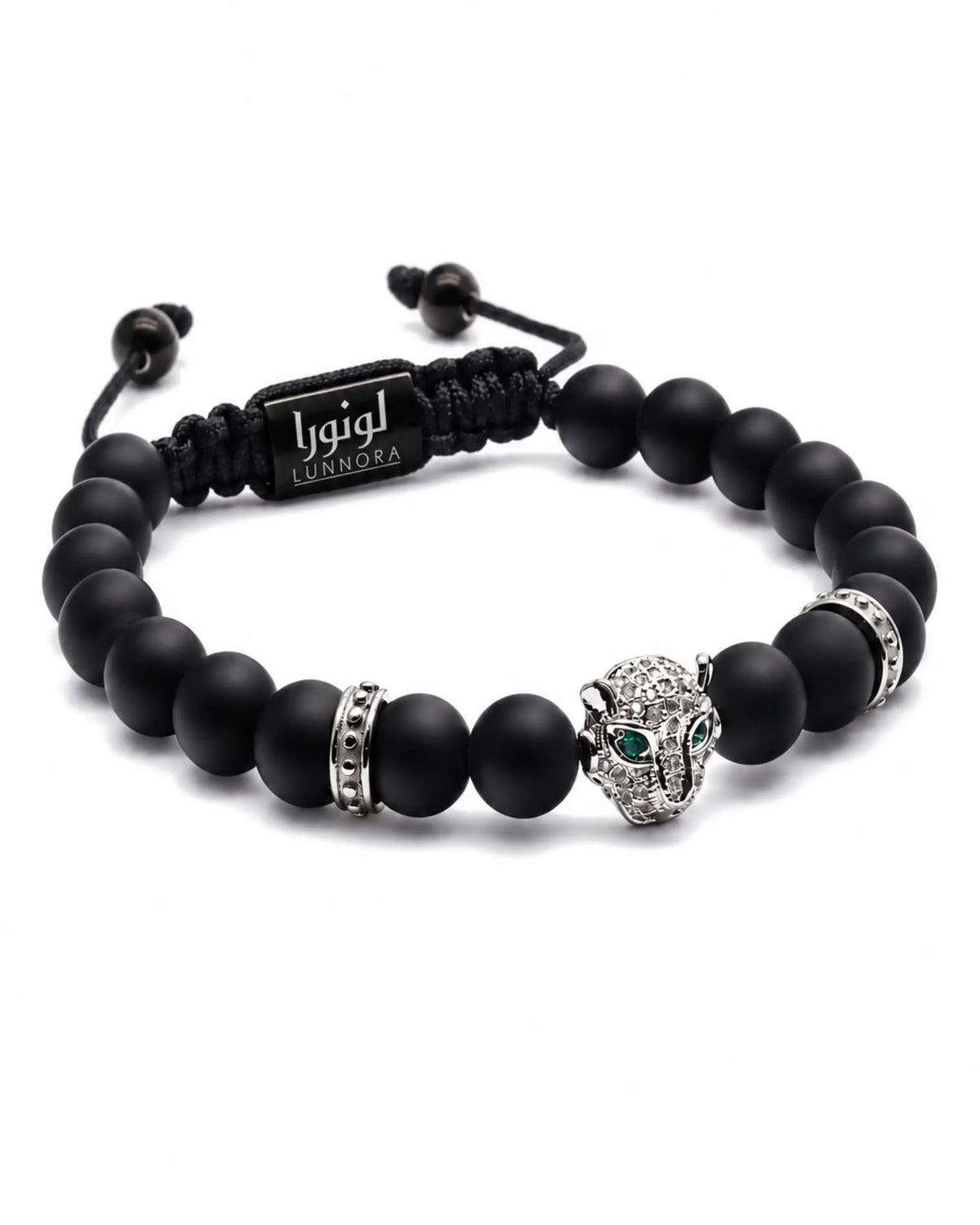 Two black beaded bracelets with silver ring accents and green cat head charm