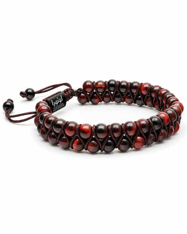 Bracelet with red-brown bead rows and black accents, with logo charm at center