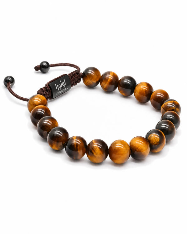 Tiger eye beaded bracelet with brown and black bead pattern and dark logo plate
